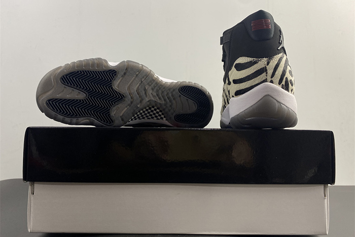 Air Jordan 11 “Animal Instinct” Black / Red / Sail / White